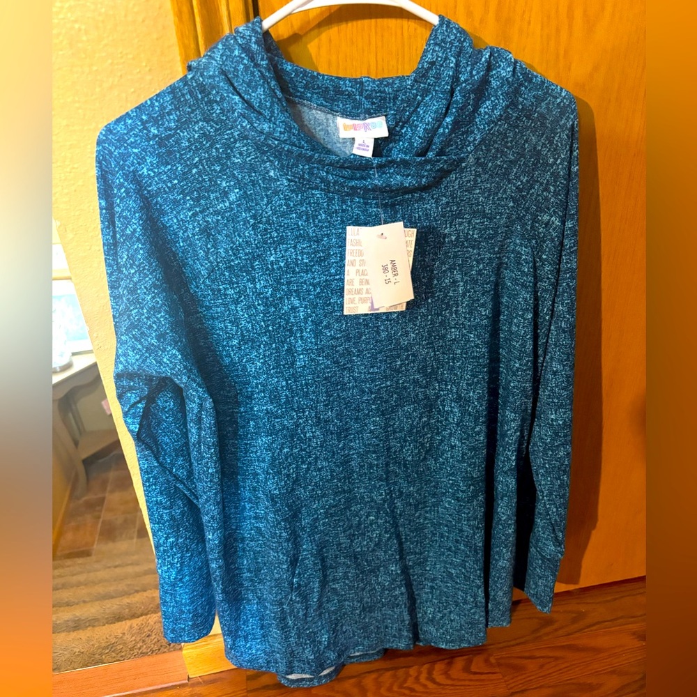 Teal long sleeved Amber. Large LuLaRoe, relaxed fit, never been worn, NEW